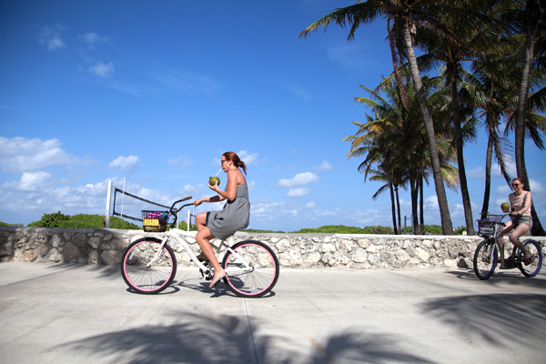 On Wednesday afternoon, two friends take advantage of the bike trail along Ocean Drive. Miami Beach has wide paths specifically for bikers and implemeting the Deco Bike program to make the city more biker-friendly. Cayla Nimmo // Photo Editor