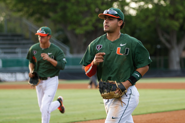 Junior shortstop Alexander Hernandez runs off the field at the end of an inning on Wednesday night's game against Bethune-Cookman. Nicholas Gangemi // Staff Photographer
