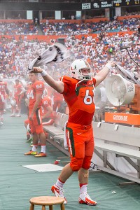 Senior Paul Kelly (61) fires up the crowd during Saturday's game. Nick Gangemi // Assistant Photo Editor