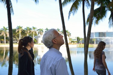 Scott Rogers, the Director of Mindfulness in Law Program, silently walks with University of Miami Law students Jackie Frisch and Stephanie Rosendorf during a meditative walk around the lake early Monday morning. These walks and other similar events are held regularly by the Law school as a way to involve students in activities that can contribute to their overall health and well-being.