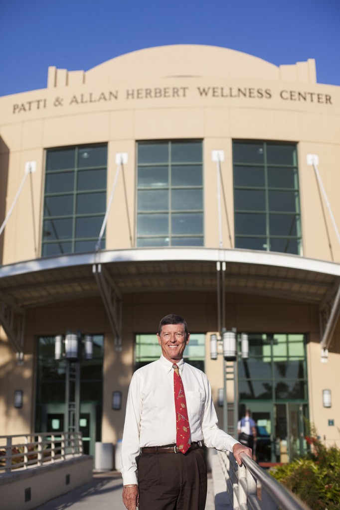 Norm Parsons poses for a portrait in front of the Wellness Center on Wednesday morning. Parsons is retiring from his position as Wellness Center director in October. Monica Herndon // Photo Editor 