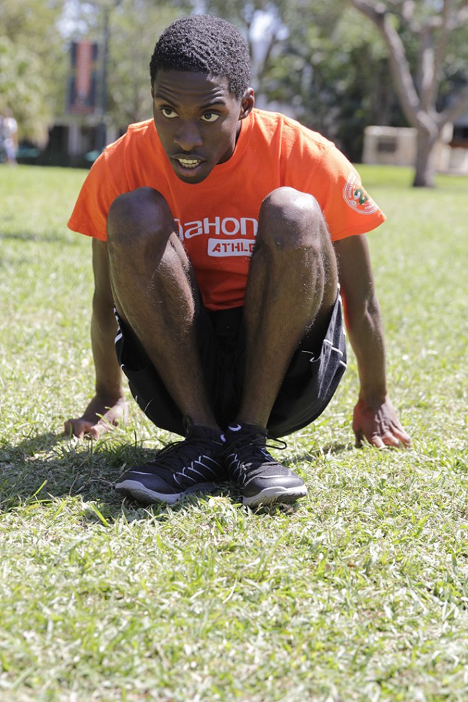 Sophomore Eric-Dillan Smith participated in the entire obstacle course which included crunches, push-ups, burpies, rowing machine, box jumps, tire lifts. Yinghui Sun // Staff Photographer