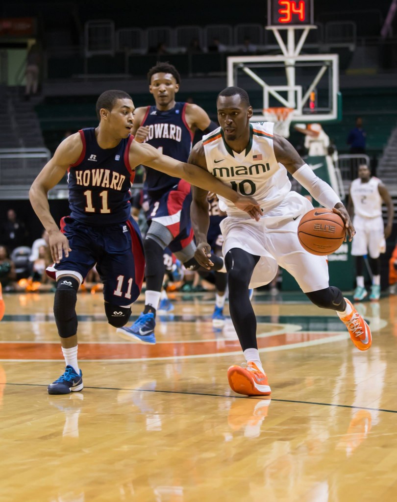 Redshirt junior Sheldon McClellan (No. 10) drives the ball down the court during Friday’s regular season home opener against Howard at the Bank United Center. Matthew Trabold // Staff Photographer