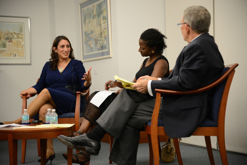 Journalist Ilene Prusher speaks with journalism professors Tsitsi Wakhisi and Joseph Treaster. // Courtesy UM Media