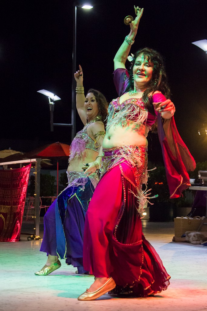 Belly dancers perform during Friday night's "A Whole New World" Canes After Dark event held on the SAC Patio. Giancarlo Falconi // Staff Photographer