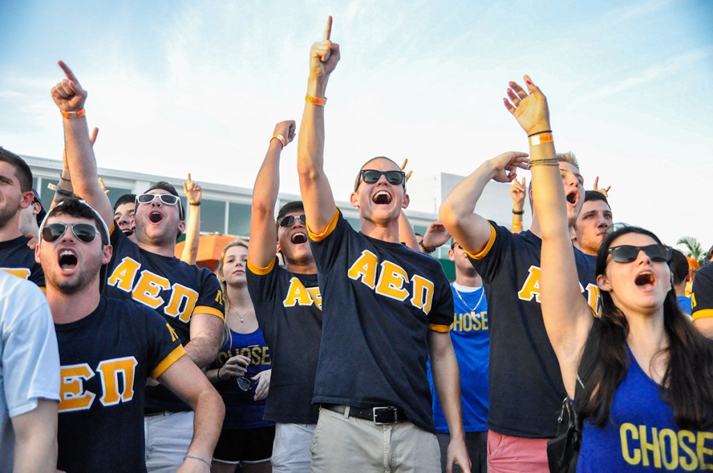 Current members of the Alpha Epsilon Pi Fraternity welcome new members during Bid Day at the Lakeside Patio Stage Friday afternoon. Holly Bensur // Ibis Yearbook