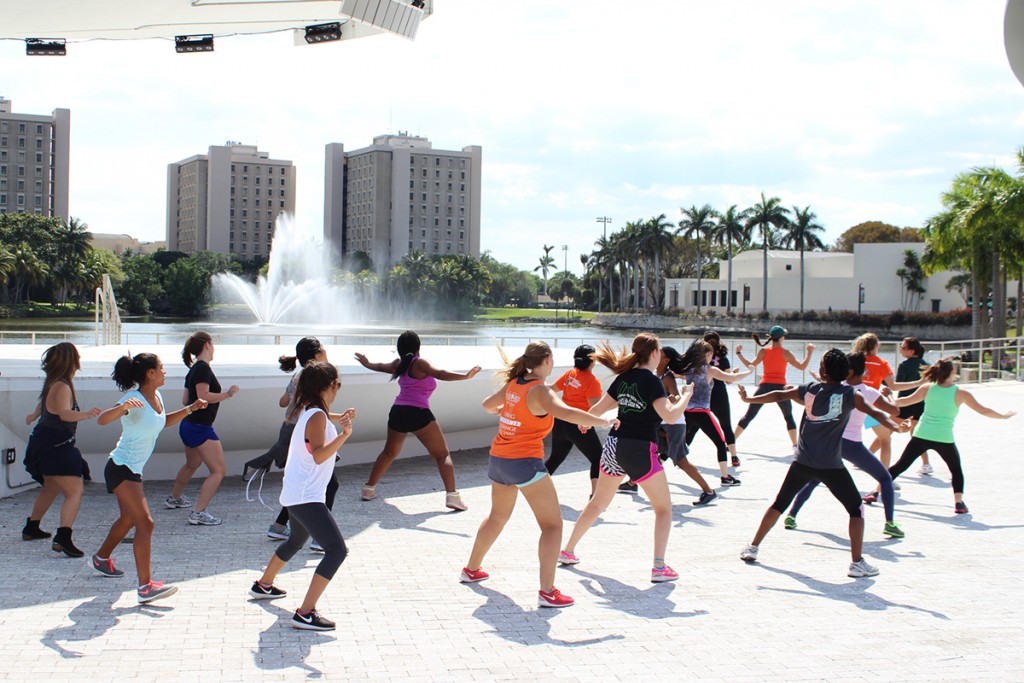 Students participate in a free Cfunk class held at the Lakeside Patio Stage Monday afternoon. Giancarlo Falconi // Staff Photographer