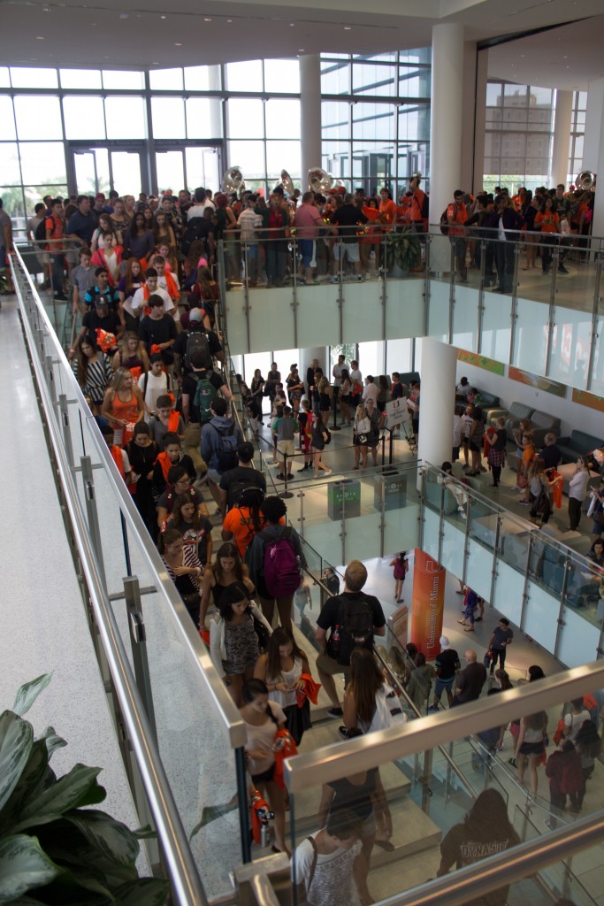 Due to inclement weather, the Nebraska Pep Rally was moved into the Shalala Student Center Thursday. Students formed lines up the stairs to get free t-shirts for the upcoming football game. Kawan Amelung // Contributing Photographer