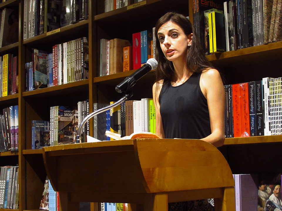 Professor Chantel Acevedo speaks about her writing career at the USpeak Flash Fiction and Poetry Performance at Books & Books. Beatriz Chinea // Contributing Photographer