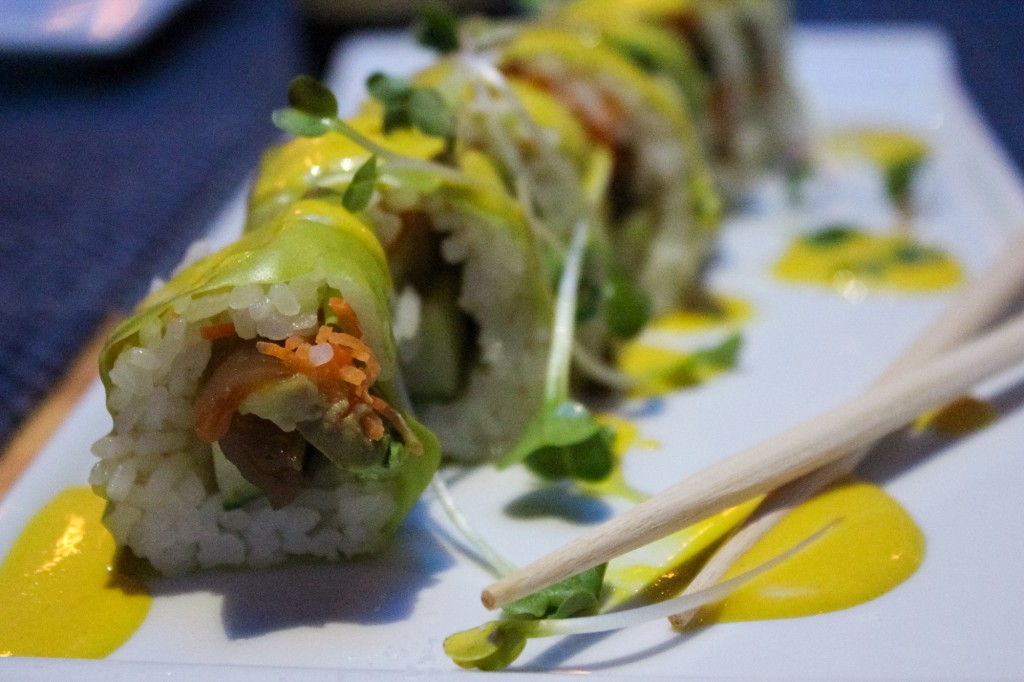 "The Veggie Head Roll" combines assorted vegetables, aji amarillo sauce, micro greens, and soy wrapper to create a flavorful twist on a classic vegetarian sushi roll. Hallee Meltzer // Photo Editor
