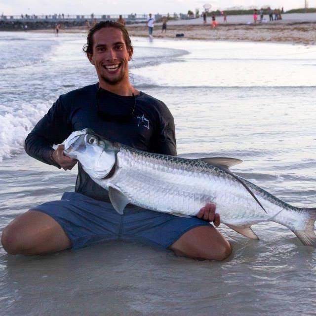 Kevin Rodriguez with a tarpon he caught last year off of South Beach. Photo Courtesy Kevin Rodriguez