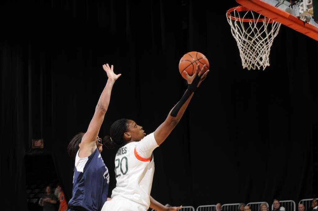 Redshirt junior Keyona Hayes (20) attempts a finger roll in a UM home game. Photo Courtesy HurricaneSports.com
