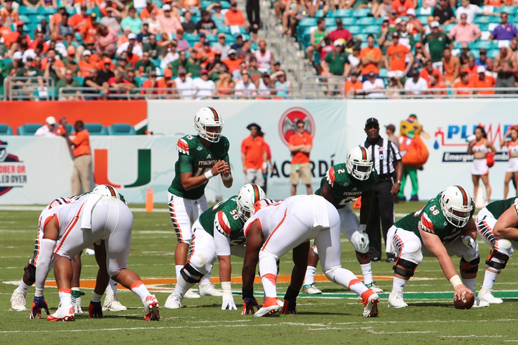 Sophomore quarterback Brad Kaaya (15) lines up behind sophomore center Nick Linder (68) during the first half of the game against Clemson on Oct. 24. The offensive line continued to struggle in protecting Kaaya during Saturday's 59-21 loss to North Carolina in Chapel Hill. Joshua Gruber // Contributing Photographer