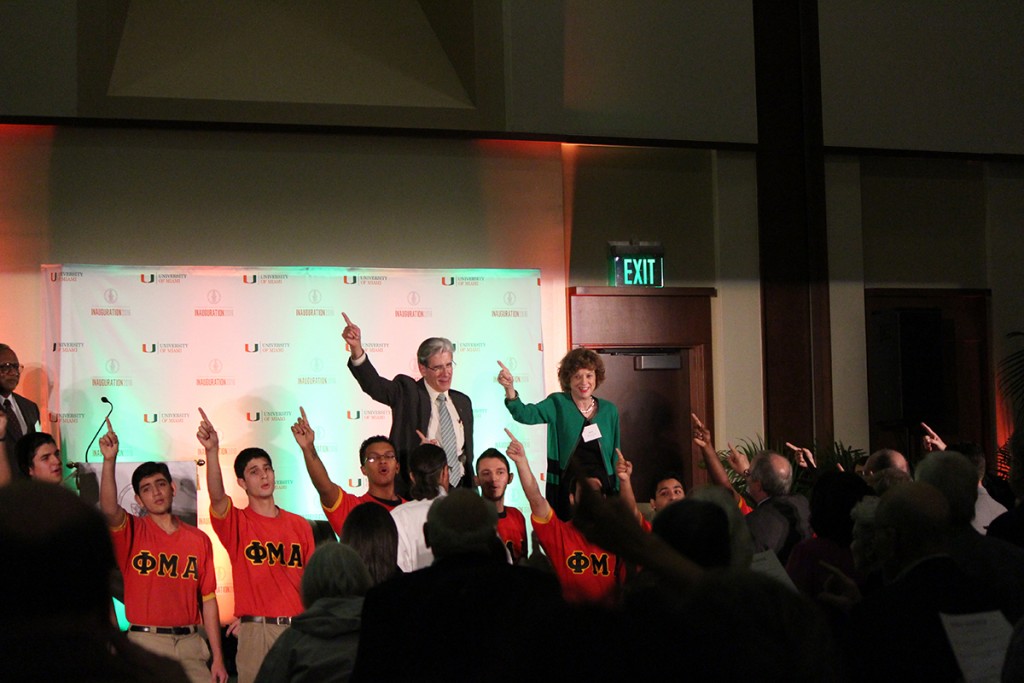 President Frenk and Arva Moore Parks sing the alma mater with Firsts at UM attendees. Hallee Meltzer // Photo Editor