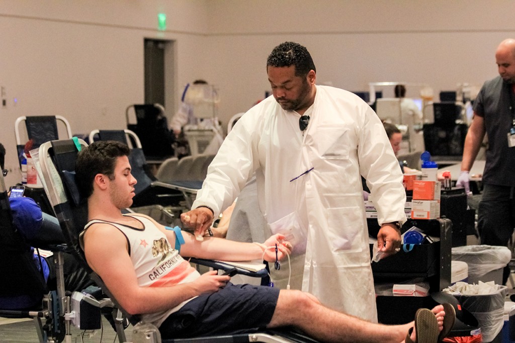 Sophomore and Pi Kappa Phi brother Thomas Rappa is prepped to donate blood during the annual Greek Week blood drive hosted in the Shalala Student Center Wednesday afternoon. Victoria McKaba // Assistant Photo Editor
