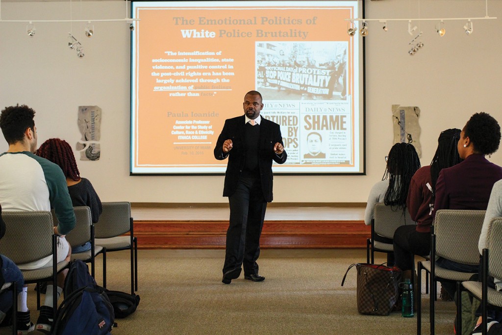 Dr. Rashawn Ray, of the University of Maryland, College Park, lectures during the Know Justice Know Peace 2 event in the CAS Gallery Wednesday afternoon. Erum Kidwai // Staff Photographer