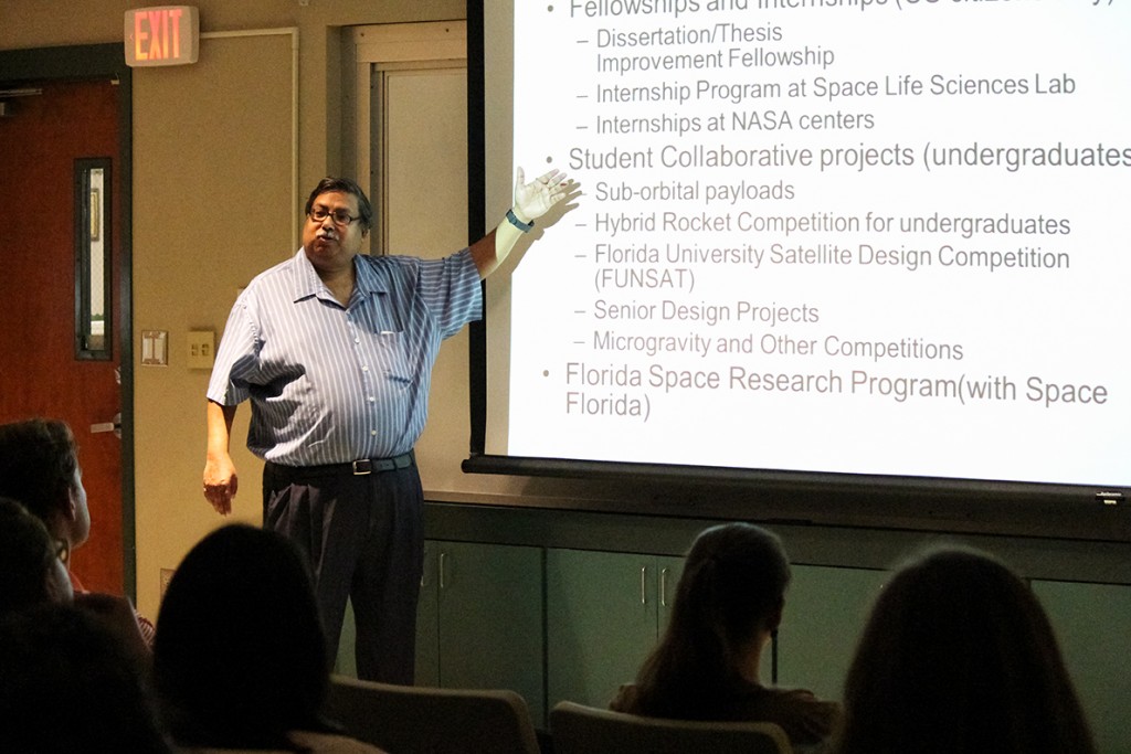 Dr. Jaydeep Mukherjee, Director of NASA's Florida Space Grant Consortium, presents to engineering students about opportunities for grants, fellowships, and scholarships Wednesday afternoon in the engineering school. Hallee Meltzer // Photo Editor