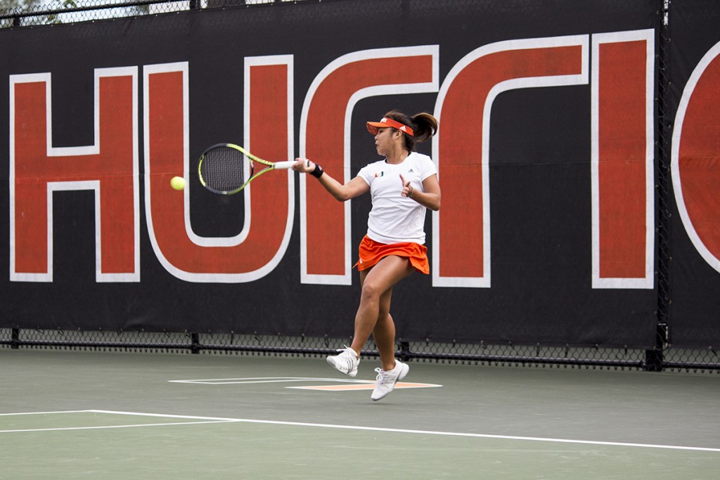 Sophomore Wendy Zhang hits a forearm shot during the Hurricanes’ January matchup against Georgia Tech. Zhang had a match point to beat Texas Tech, but ultimately lost the match in three sets during the ITA National Team Indoor Championship. Giancarlo Falconi // Staff Photographer