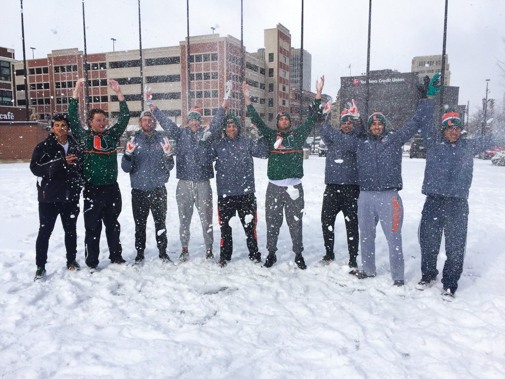 Members of the men’s baseball team play in the snowfall in Notre Dame Saturday. Two of the baseball games were cancelled due to the inclement weather. Photo courtesy Camron Ghorb
