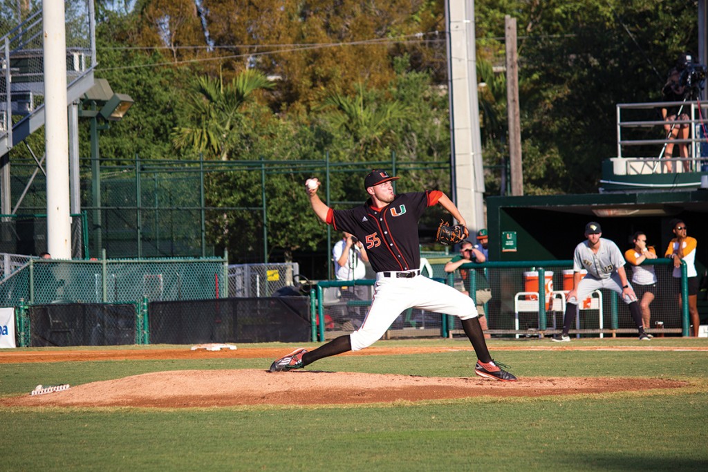 Sophomore right-hander Jesse Lepore (55) throws a pitch during the men’s baseball win over UCF Wednesday night at Alex Rodriguez Park at Mark Light Field. Giancarlo Falconi // Staff Photographer
