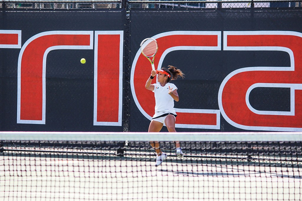 Sophomore Wendy Zhang hits a forehand shot during the Cane’s 4-2 win over Ohio State in March. Zhang had her first career win over a top-25 opponent on Saturday against Clemson. Giancarlo Falconi // Staff Photographer