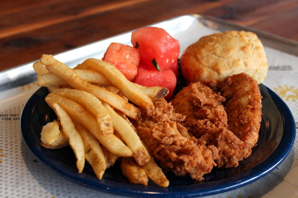 The Two Piece Jumbo Tenders Blue Plate from Spring Chicken comes with fried chicken, house fries, and minty watermelon. Hallee Meltzer // Photo Editor