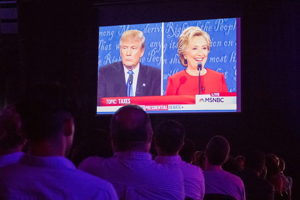 Students and community members gather at the Convocation Center Fieldhouse Monday evening to watch the first of the Presidential Debates. Samuel Montero // Contributing Photographer