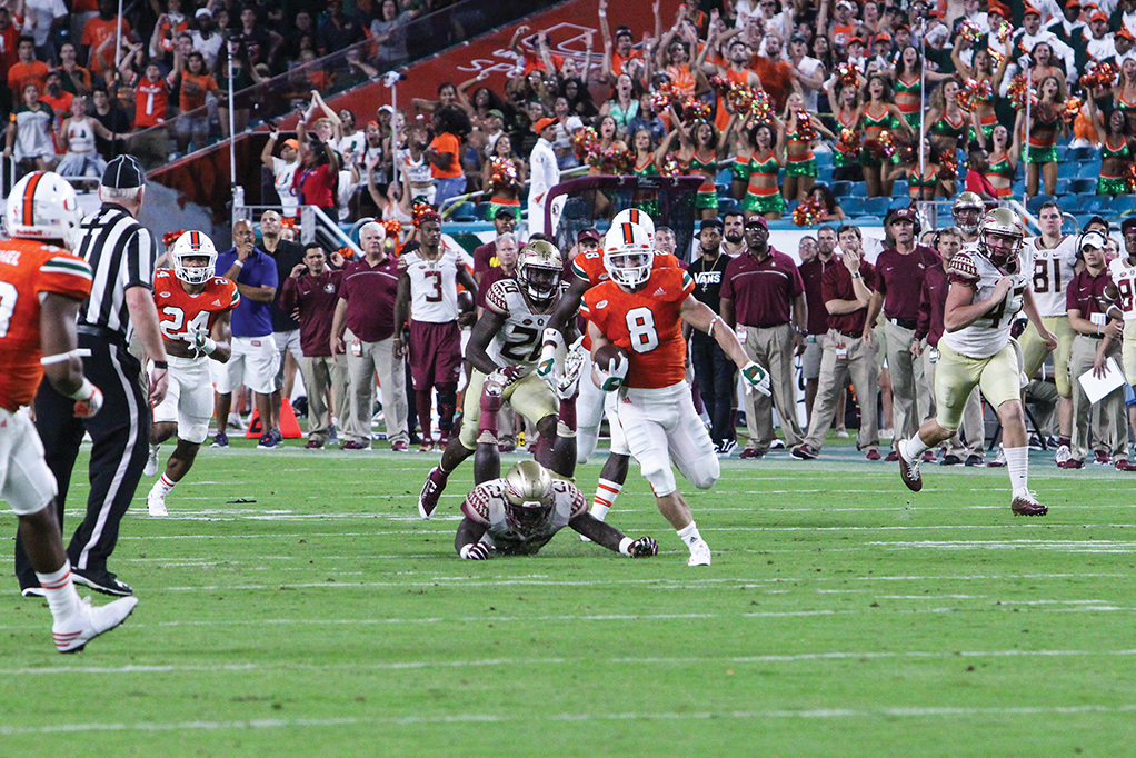 Junior wide receiver Braxton Berrios (8) breaks free on the kick return which set up the Hurricanes for a touchdown late in the fourth quarter during the 20-19 loss to FSU Saturday at Hard Rock Stadium. Hallee Meltzer // Photo Editor
