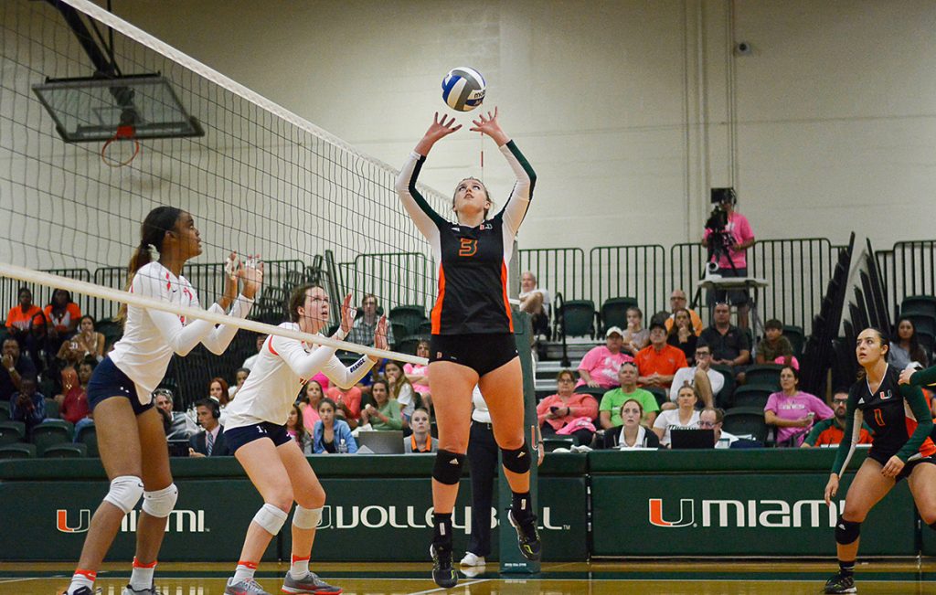 Freshman setter Hannah Sorensen (3) sets the ball for the Hurricanes during their 3-1 loss to Syracuse Sunday afternoon in the Knights Sports Complex. Josh White // Contributing Photographer