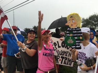 A pinata of Hillary Clinton in a prison outfit is held up by the "Deplorable women for Trump." Photo by Assistant News Editor Amanda Herrera