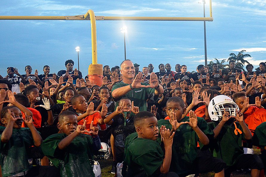 Mark Richt visits Mills Pond Park in Ft. Lauderdale last Thursday to speak to the Ft. Lauderdale Hurricanes, a local, youth football team. Josh White // Contributing Photographer