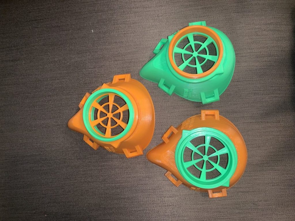 The Levine brothers created a partially-assembled orange and green prototype to hand out to UM healthcare workers.