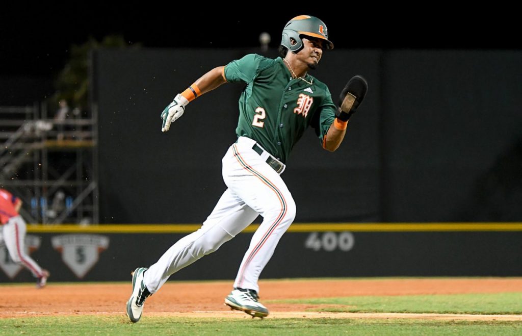 Freddy Zamora rounds third base against Florida Atlantic University on Feb. 20, 2020 at Mark Light Field. The Hurricanes defeated the Owls 11-4.