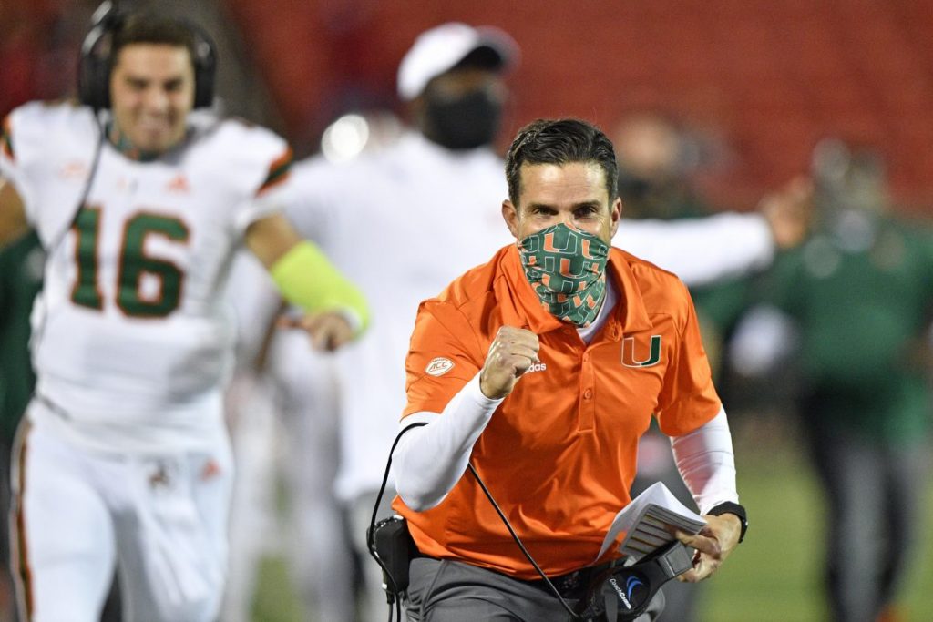 Head Coach Manny Diaz reacts after a touchdown during the second half of play against the Louisville Cardinals at Cardinal Stadium in Louisville, Ky. on Saturday, Sept. 19. Miami defeated Louisville 47-34.