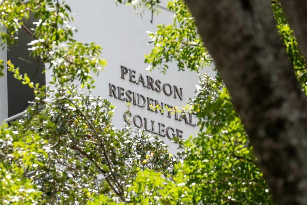 Pearson Residential College, seen through leaves on July 10.