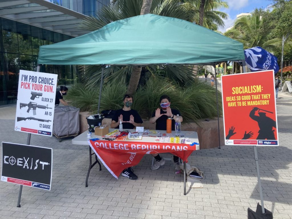 Members of the University of Miami College Republicans table outside of the Shalala Student Center on Thursday, Oct. 28.