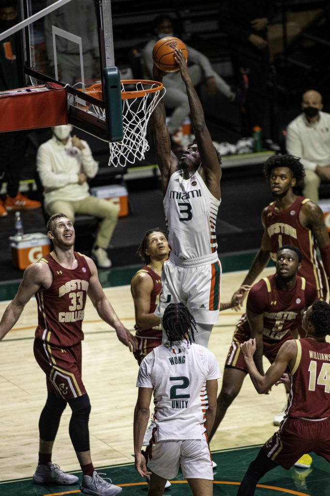 Senior Nasier Brooks attempts to dunk the ball after getting a rebound in the late minutes of Miami's win over Boston College Friday Mar. 5. Brooks scored 21 points while adding four rebounds.
