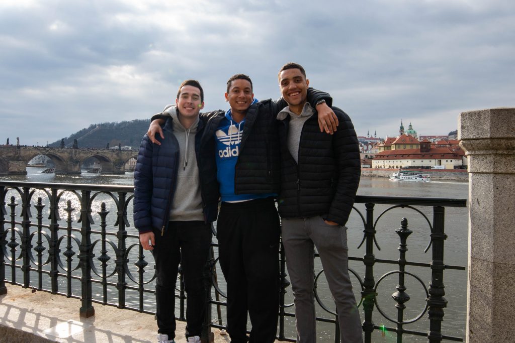 Pictured: Nate Smith (left), Ian Thomas (middle) and Marco Pierce (right) pose for a photo in Prague days before President Donald Trump closed U.S. borders to Europe