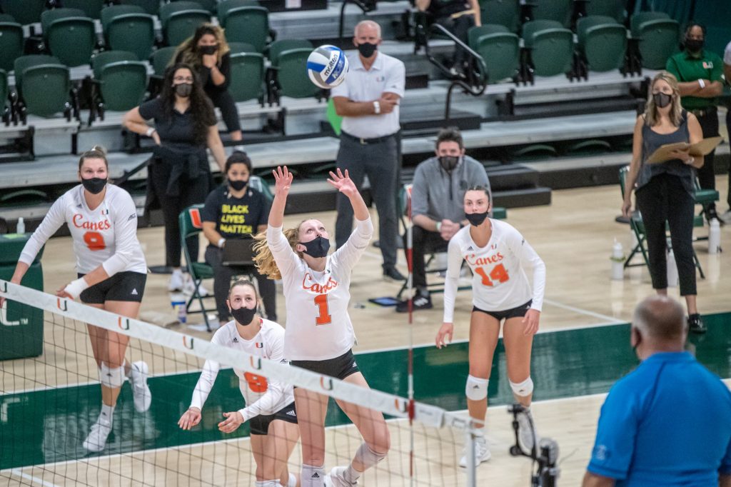 Junior Savannah Vach sets a ball during Miami’s loss to Louisville April 1, 2021 at the Knight Sports Complex.