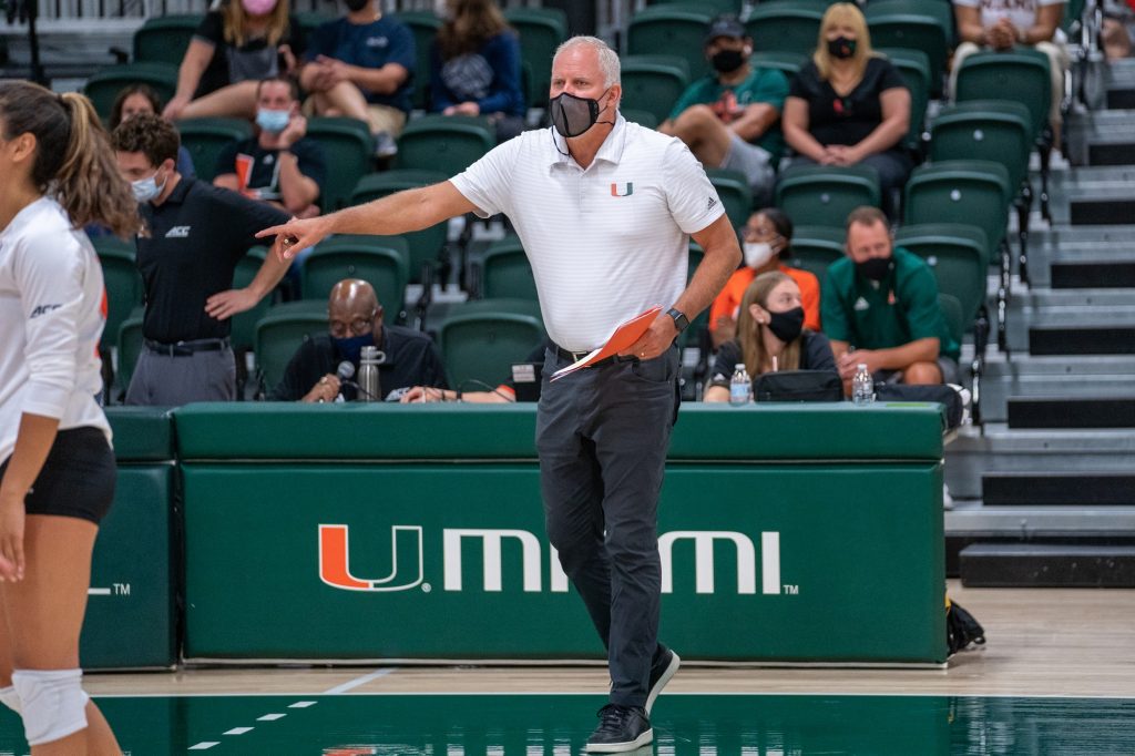 Head coach Jose “Heno” Gandara instructs the players during the Canes’ game versus UMBC in the Knight Sports Complex on Aug. 29, 2021.