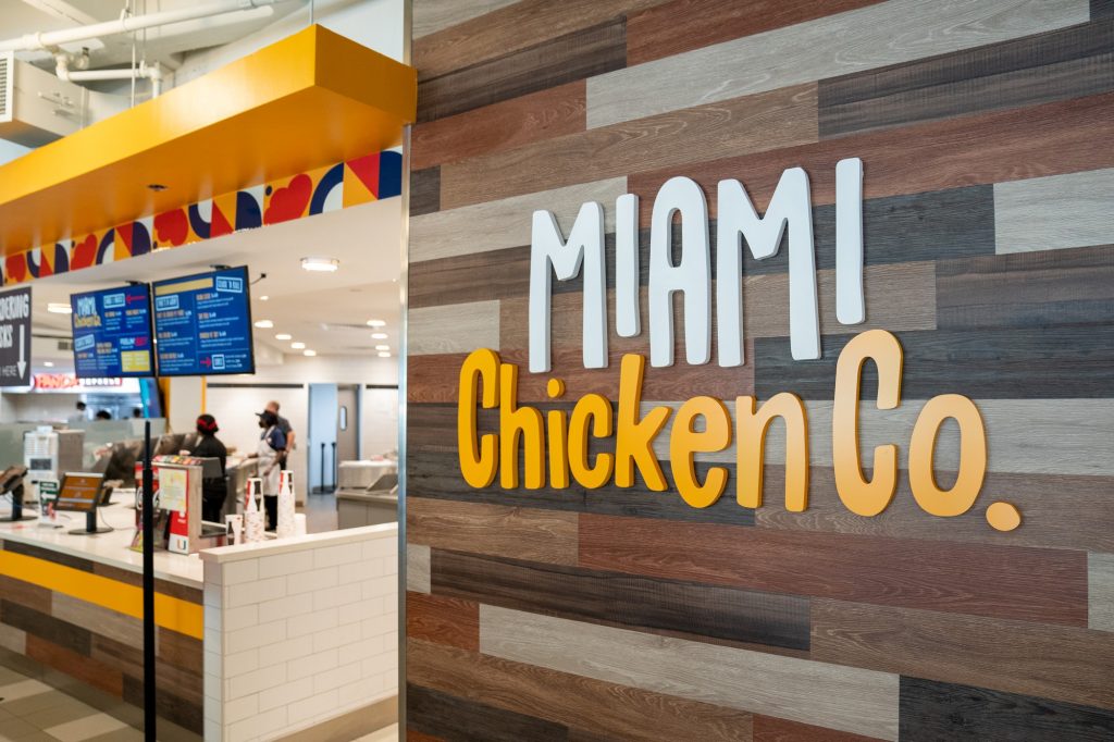 The sign for Miami Chicken Company, the newest option in on-campus dining in the Hurricane Food Court on UM's Coral Gables campus. The restaurant's theme was a result of performance assessments done by UM and food-service provider Chartwells.