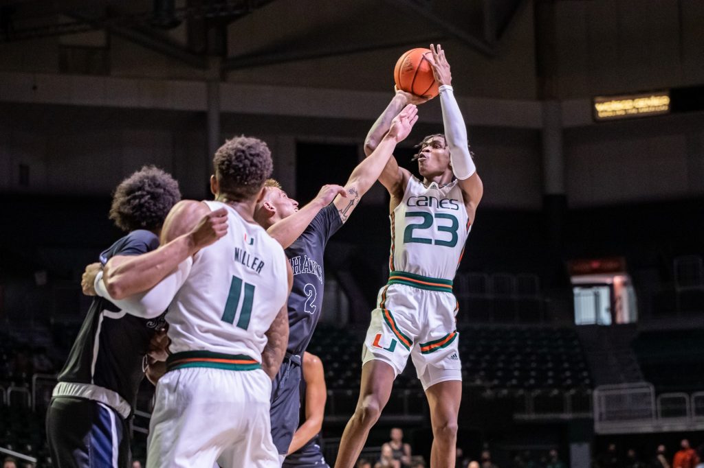 Sixth-year redshirt senior Kameron McGusty takes a shot from the top of the key in an exhibition game against Nova Southeastern on Wednesday Oct. 20 at the Watsco Center in Coral Gables. Miami emerged victorious 106-95.