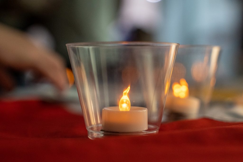 A “candle” sits in a cup at one station at the Asian American Students Association’s 2021 Lantern Festival at the Lakeside Patio on Oct. 23, 2021.