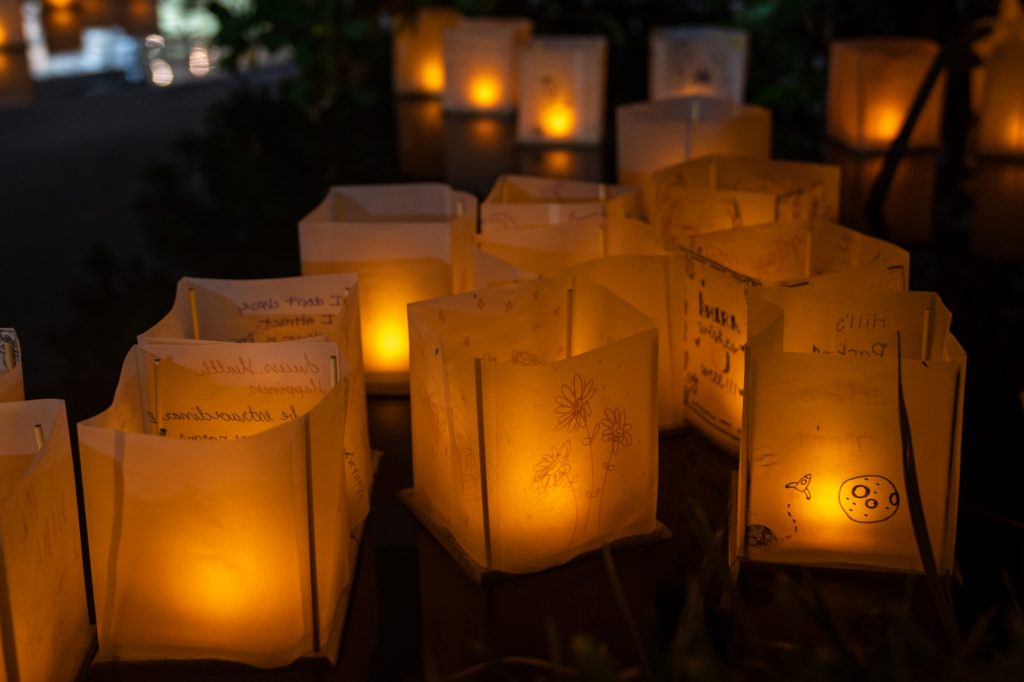Paper lanterns float in Lake Osceola after being released during the Asian American Students Association’s 2021 Lantern Festival on Oct. 23, 2021.