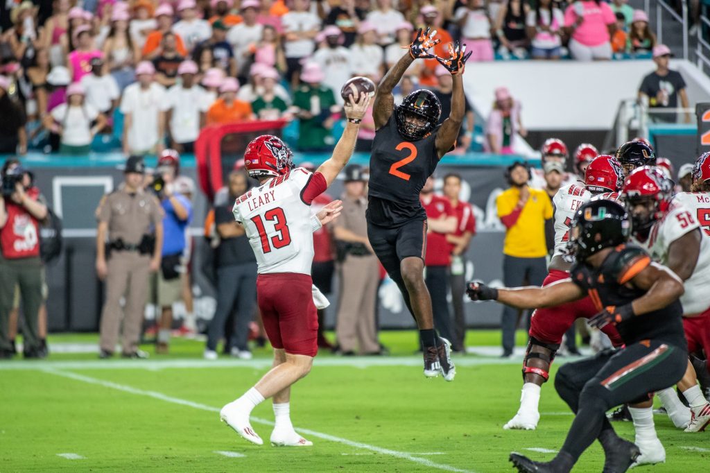 Sophomore Tyrique Stevenson jumps in an attempt to block a pass in Miami's win over NC State on Saturday Oct. 23 at Hard Rock Stadium in Miami.