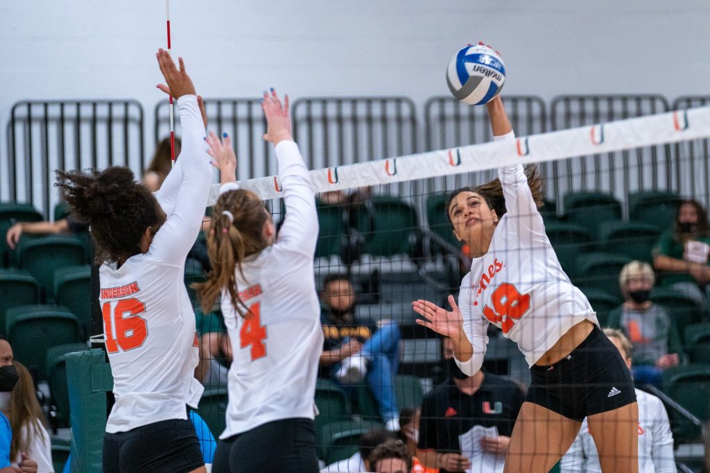 Freshman outside hitter Peyman Yardimci spikes the ball during warm ups prior to the Canes’ game versus UMBC in the Knight Sports Complex on Aug. 29, 2021.