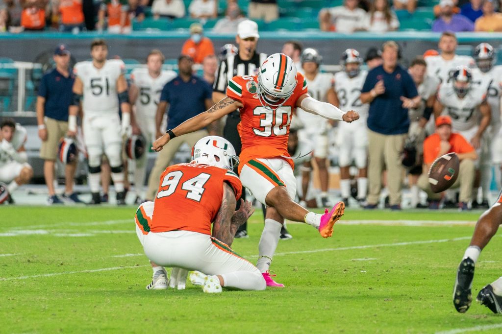 Freshman kicker Andres Borregales kicks a field goal attempt in the final seconds of the fourth quarter of Miami’s game versus the University of Virginia at Hard Rock Stadium on Sept. 30, 2021. Borregales missed the kick, and Miami lost 28-30.