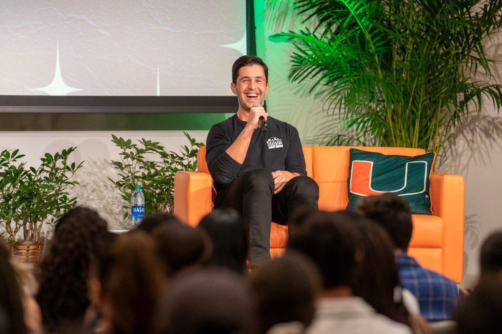 Actor Josh Peck laughs while telling a story to the crowd in the Shalala Center grand ballroom at the What Matters to U event on Oct. 21, 2021.