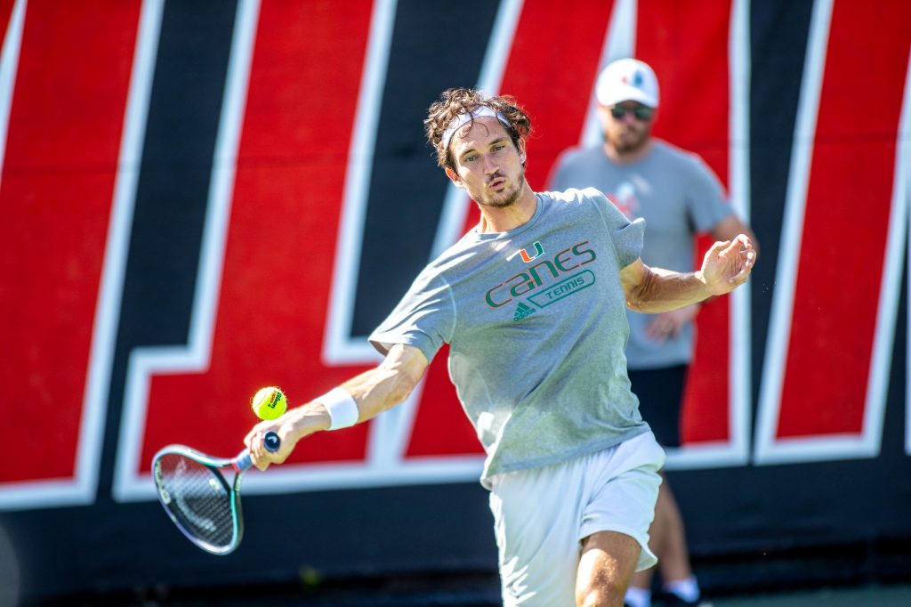 Fifth-year senior Benjamin Hannestad returns a ball during practice on Wednesday Oct. 27 at the Neil Schiff Tennis Center in Coral Gables.