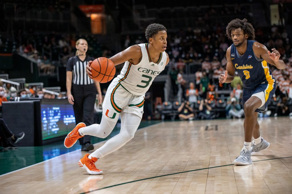 Sixth-year redshirt senior transfer Charlie Moore drives to the basket during Miami’s win over Canisius on Tuesday, Nov. 9 at the Watsco Center.